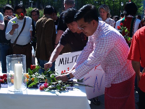 Burmese demonstrators laying flowers on the table. Oslo 9 May 08 350.jpg