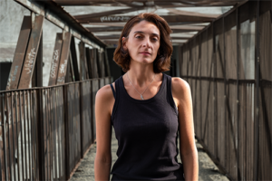 Natia Tavberidze, Human Rights House Tbilisi / Photographed by Tamta Chkhaidze, at one of the bridges connecting "Shatili Buildings" in Tbilisi, Georgia, September 2024.